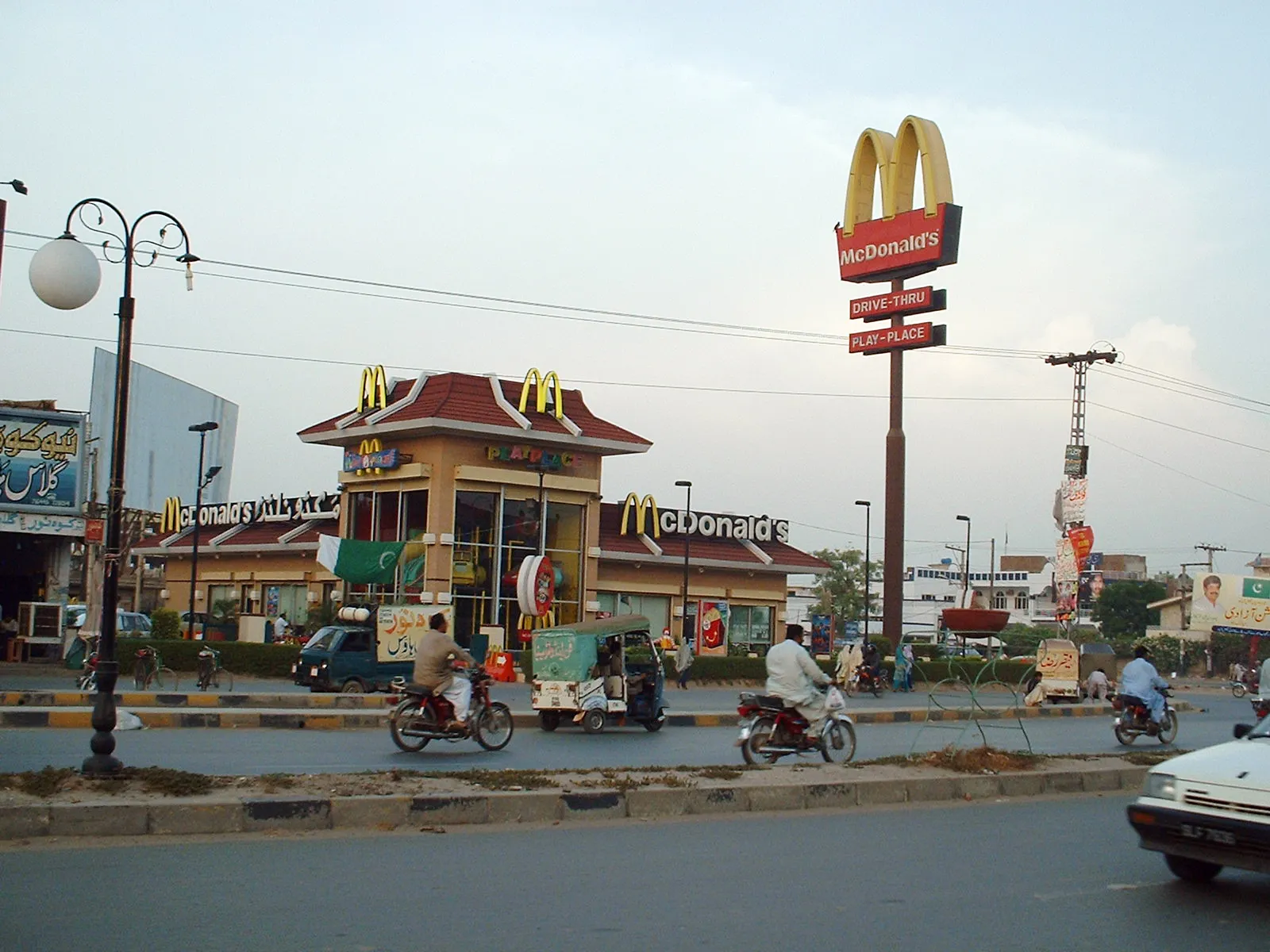 McDonald's square in Peoples Colony, Faisalabad, with traffic